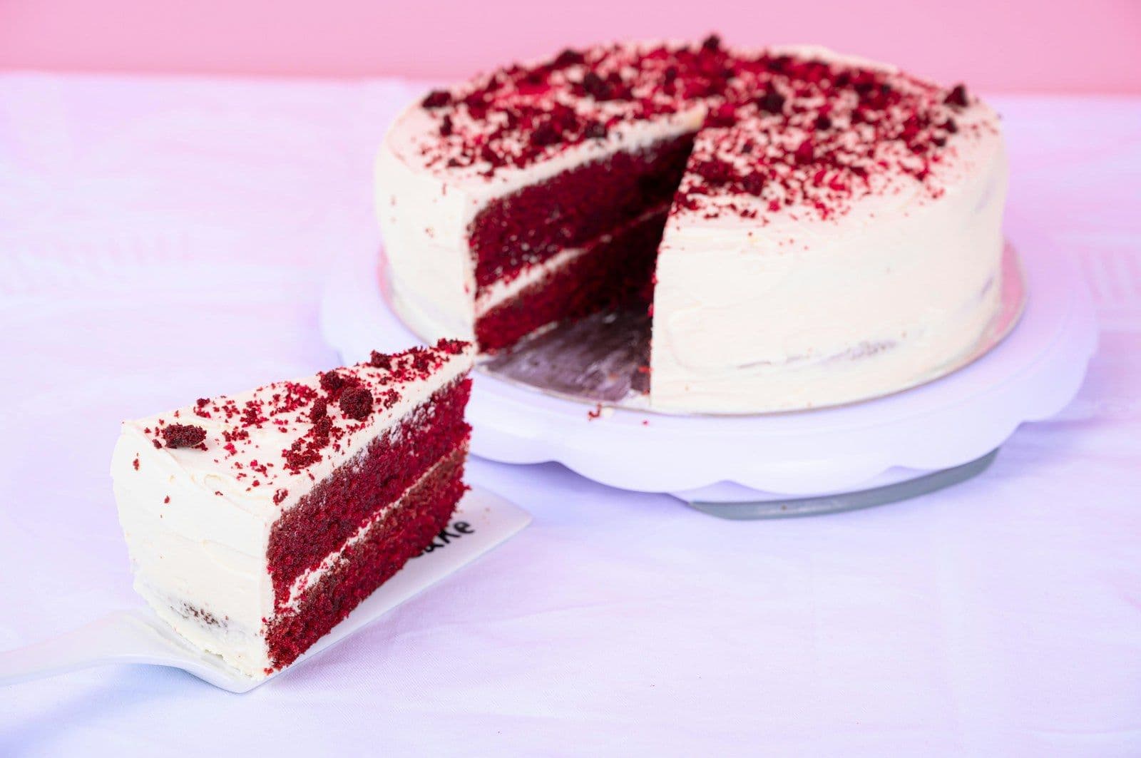 Red velvet cake with a slice cut